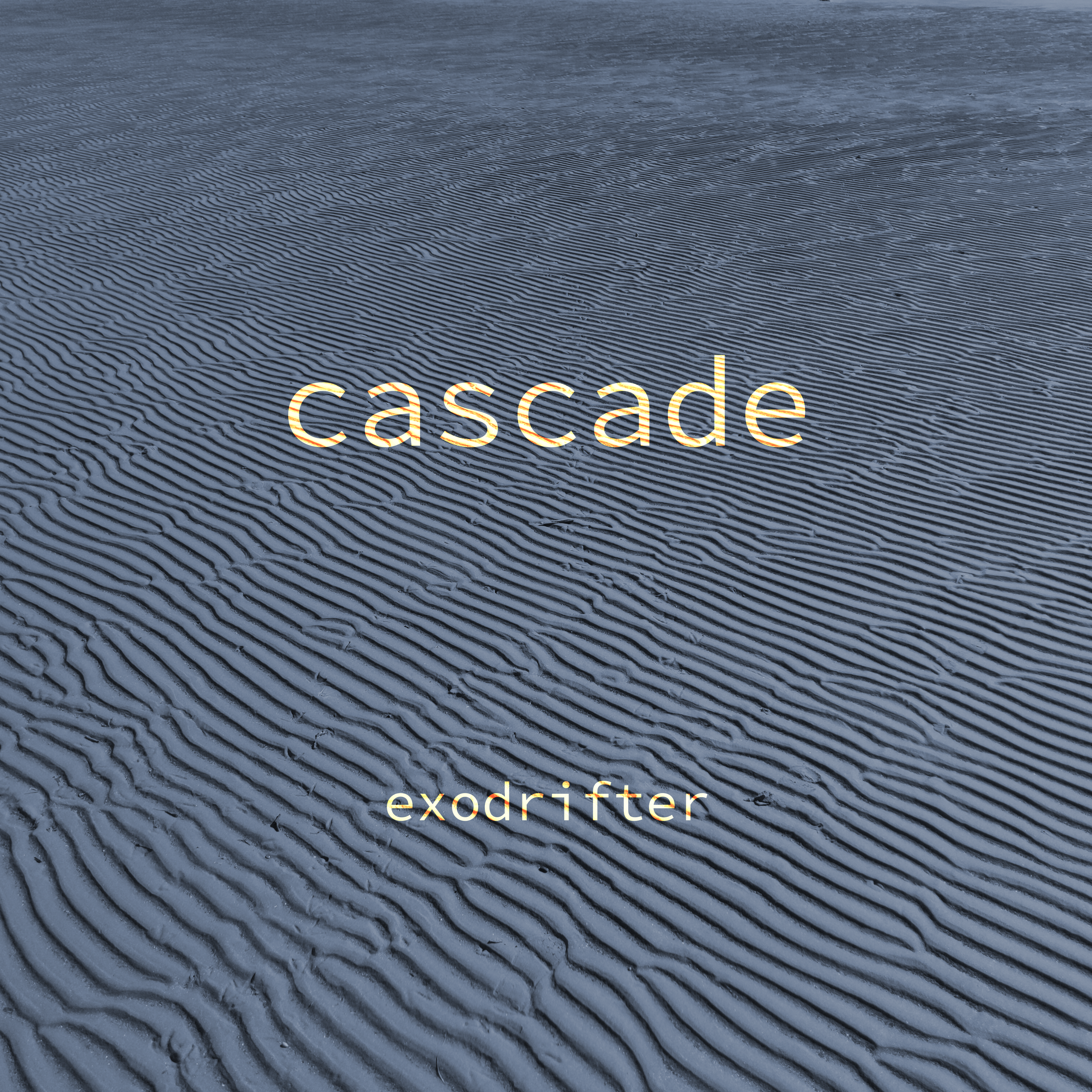 cascade album art, which pictures wet sand set in a wavey pattern.